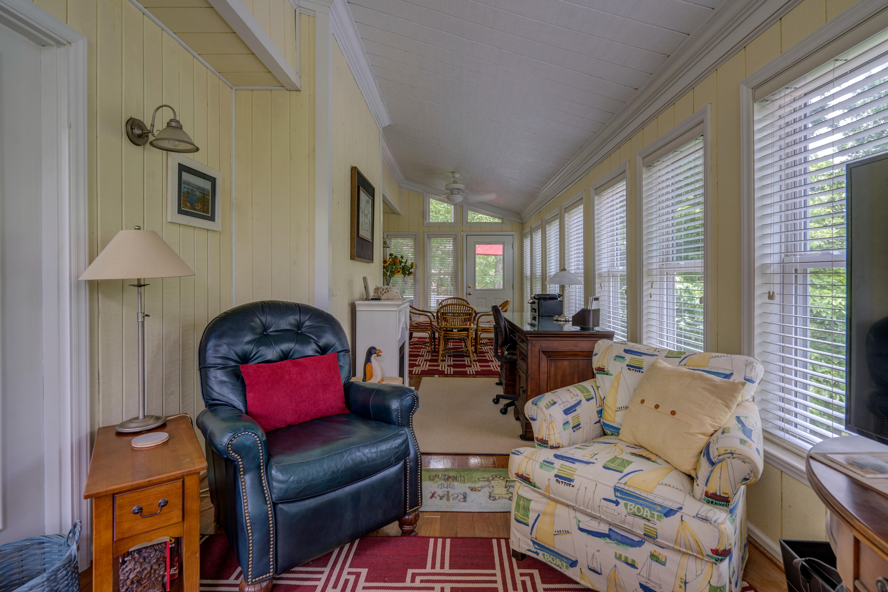 161 Highland Lake Road Union Hall, VA 24176 - Photo 14 of 45 a living room with furniture fireplace and a large window