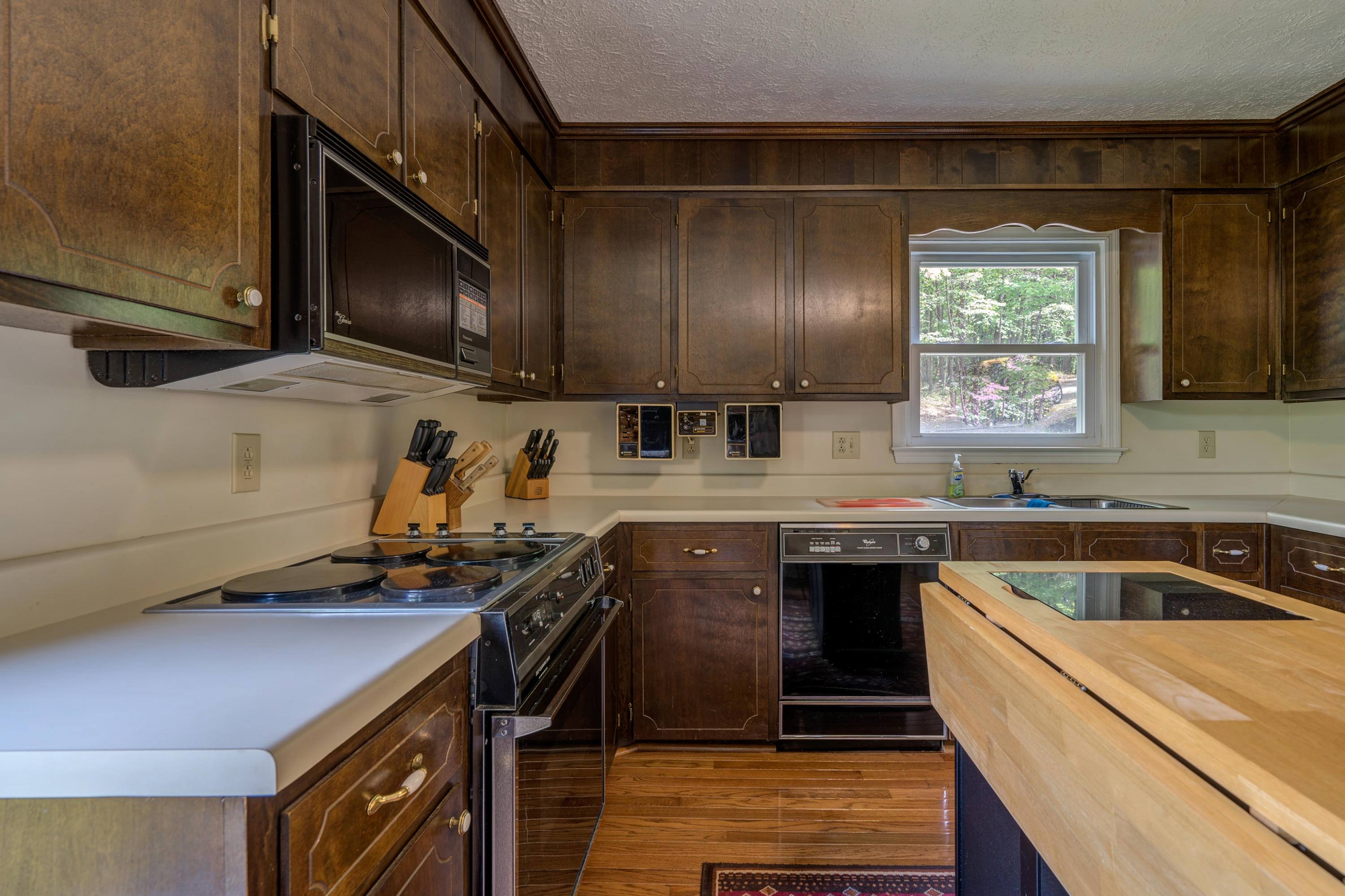 161 Highland Lake Road Union Hall, VA 24176 - Photo 18 of 45 a kitchen that has a sink and a stove