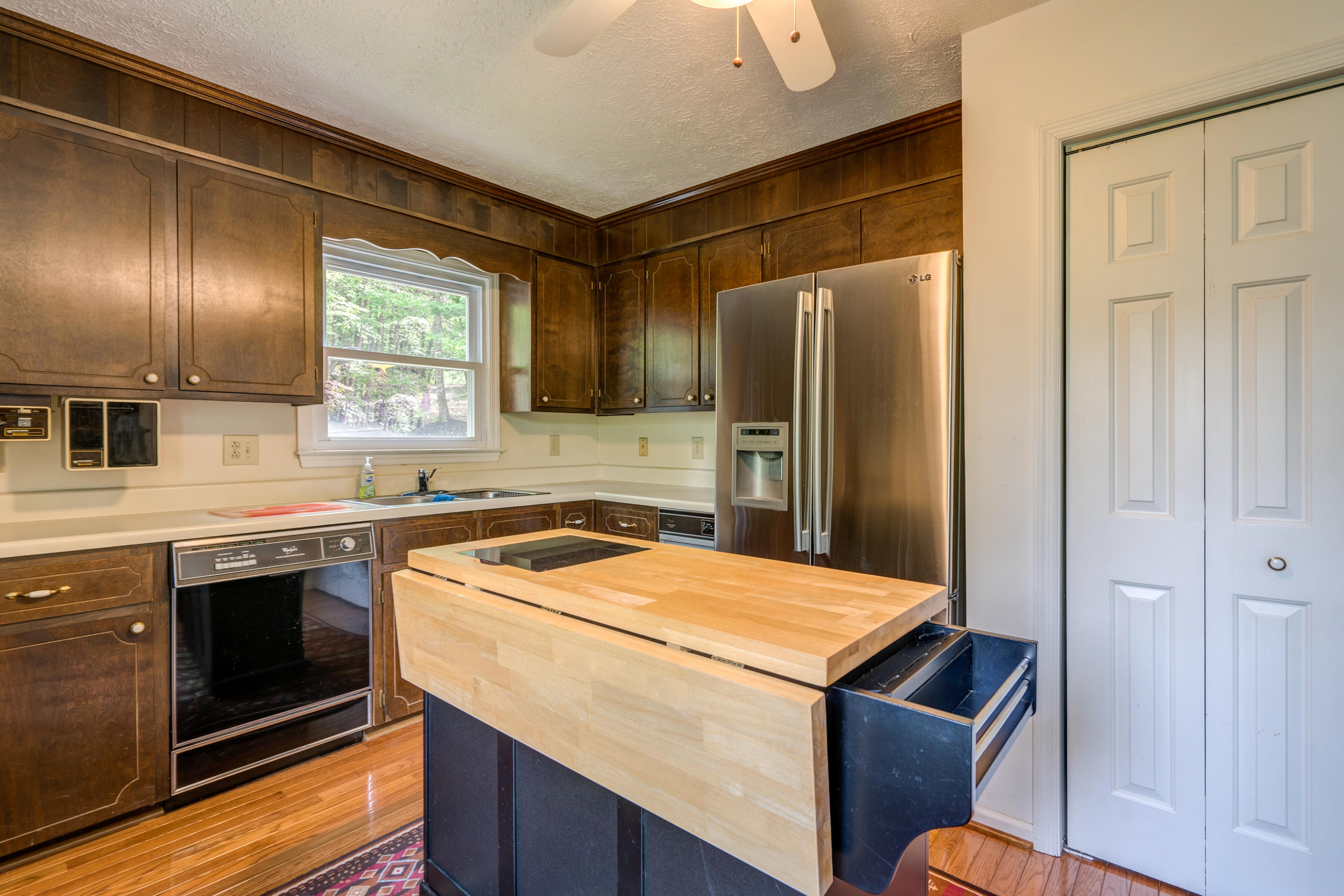 161 Highland Lake Road Union Hall, VA 24176 - Photo 19 of 45 a kitchen that has a sink a stove and a refrigerator