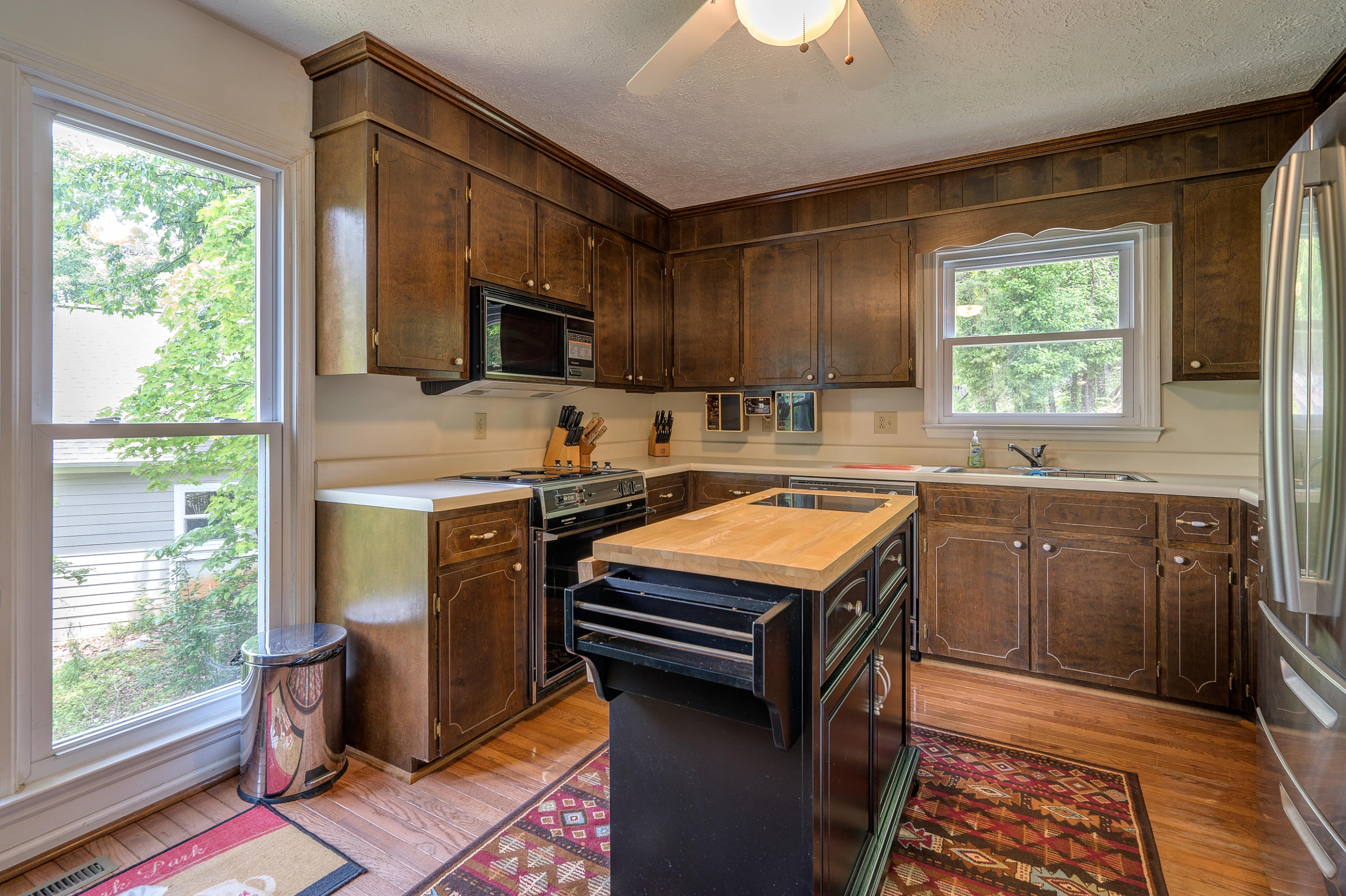 161 Highland Lake Road Union Hall, VA 24176 - Photo 20 of 45 a kitchen with kitchen island granite countertop a sink appliances and cabinets