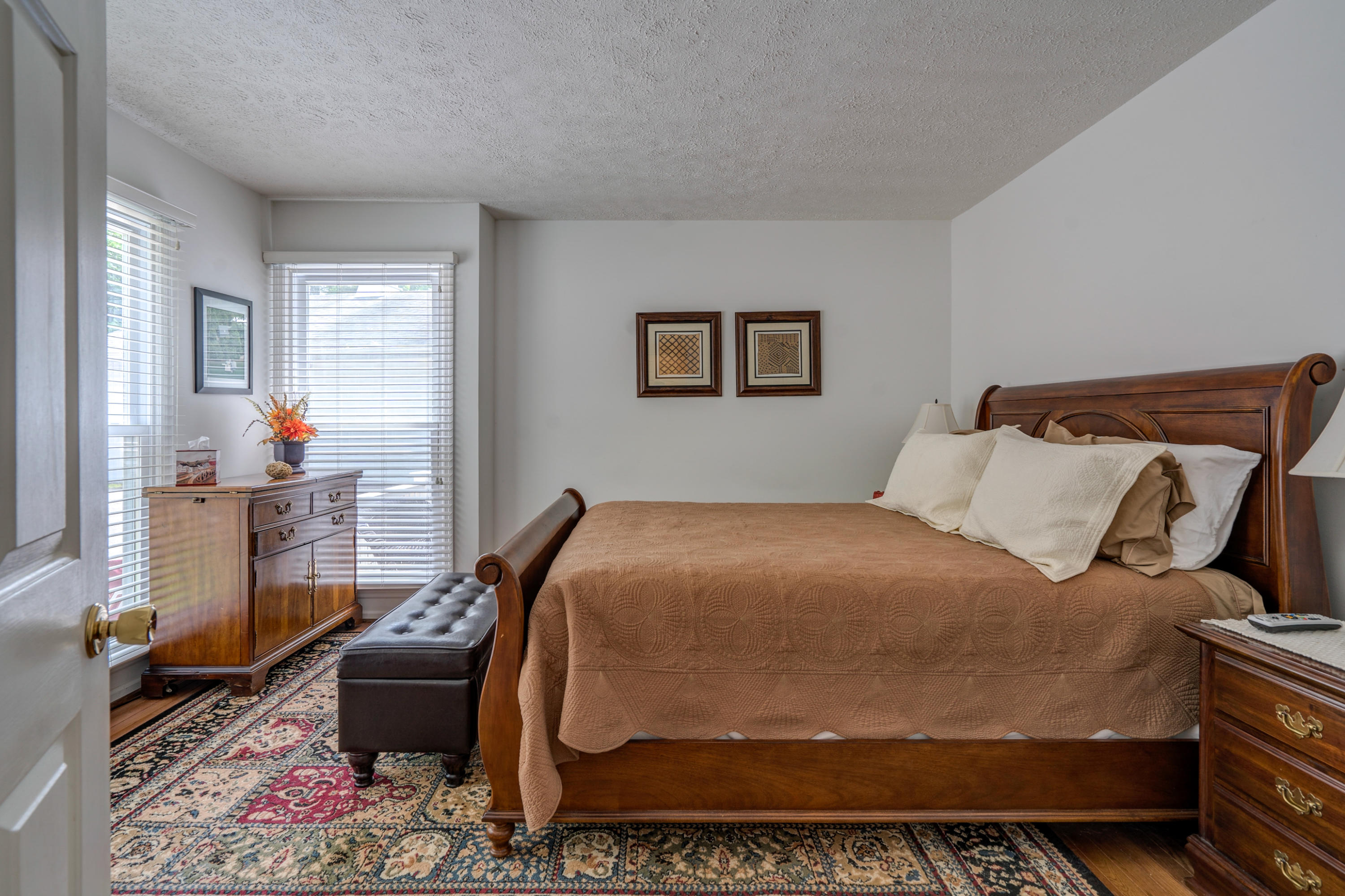 161 Highland Lake Road Union Hall, VA 24176 - Photo 23 of 45 a bedroom with a bed and wooden floor