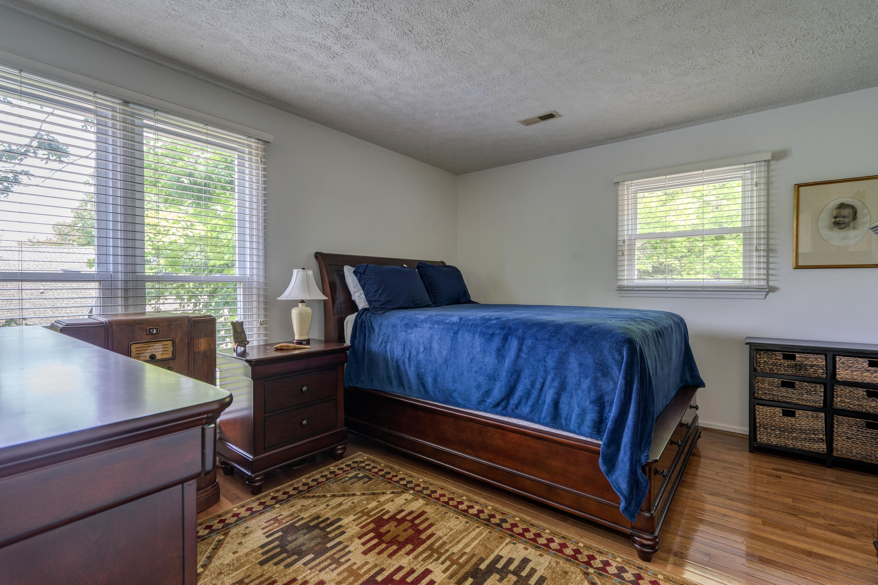 161 Highland Lake Road Union Hall, VA 24176 - Photo 25 of 45 a bedroom with a bed and windows