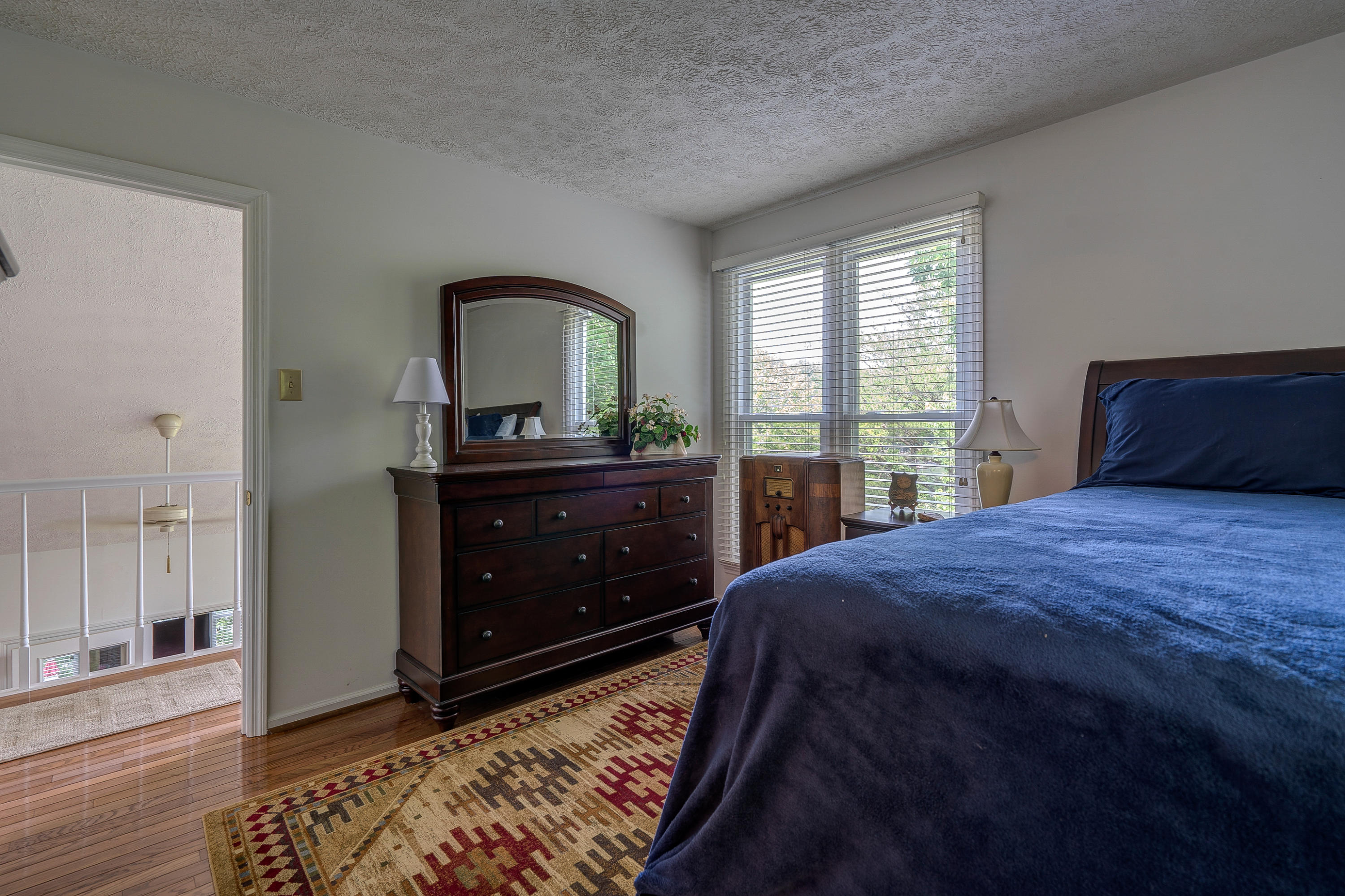 161 Highland Lake Road Union Hall, VA 24176 - Photo 26 of 45 a bedroom with a bed and a dresser