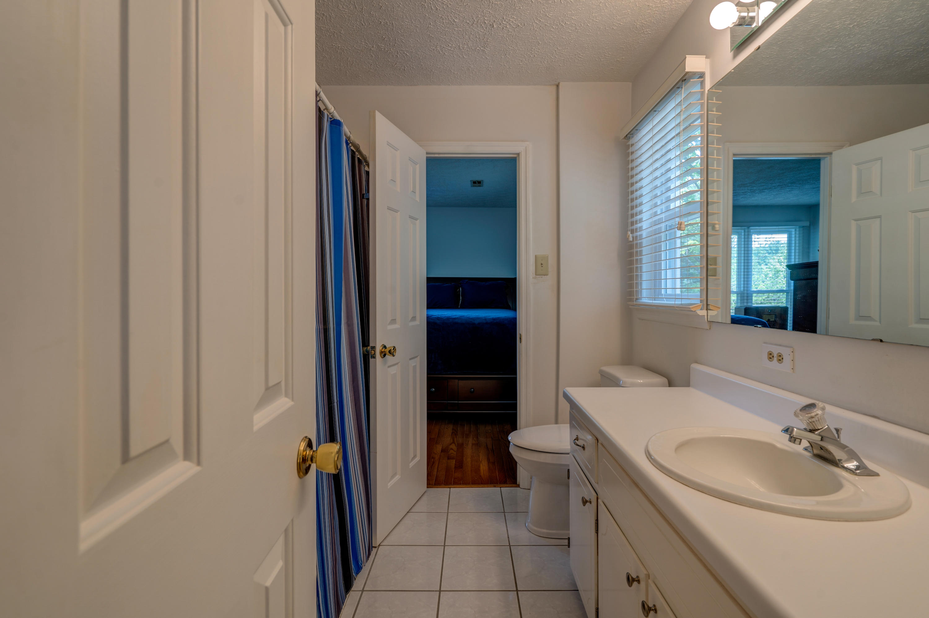 161 Highland Lake Road Union Hall, VA 24176 - Photo 28 of 45 a bathroom with a sink and a mirror