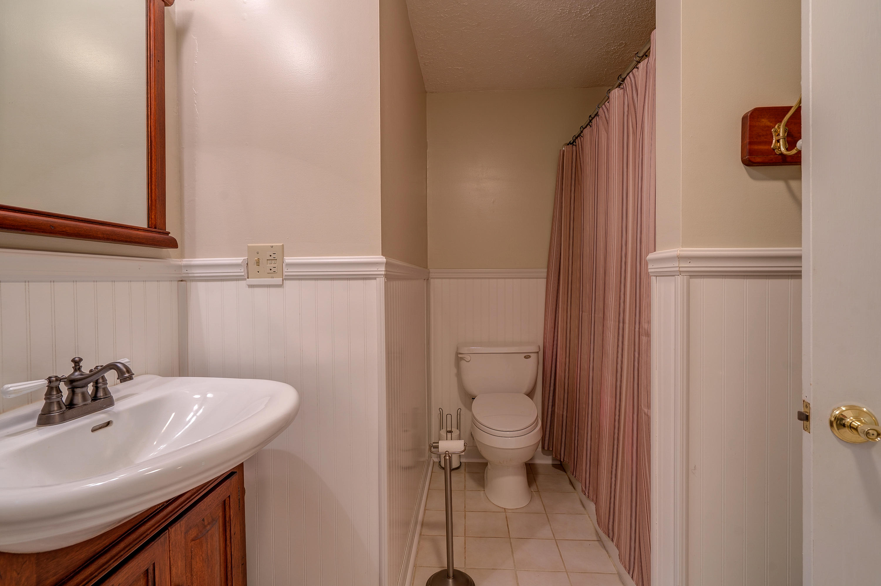 161 Highland Lake Road Union Hall, VA 24176 - Photo 34 of 45 a bathroom with a sink a toilet and shower
