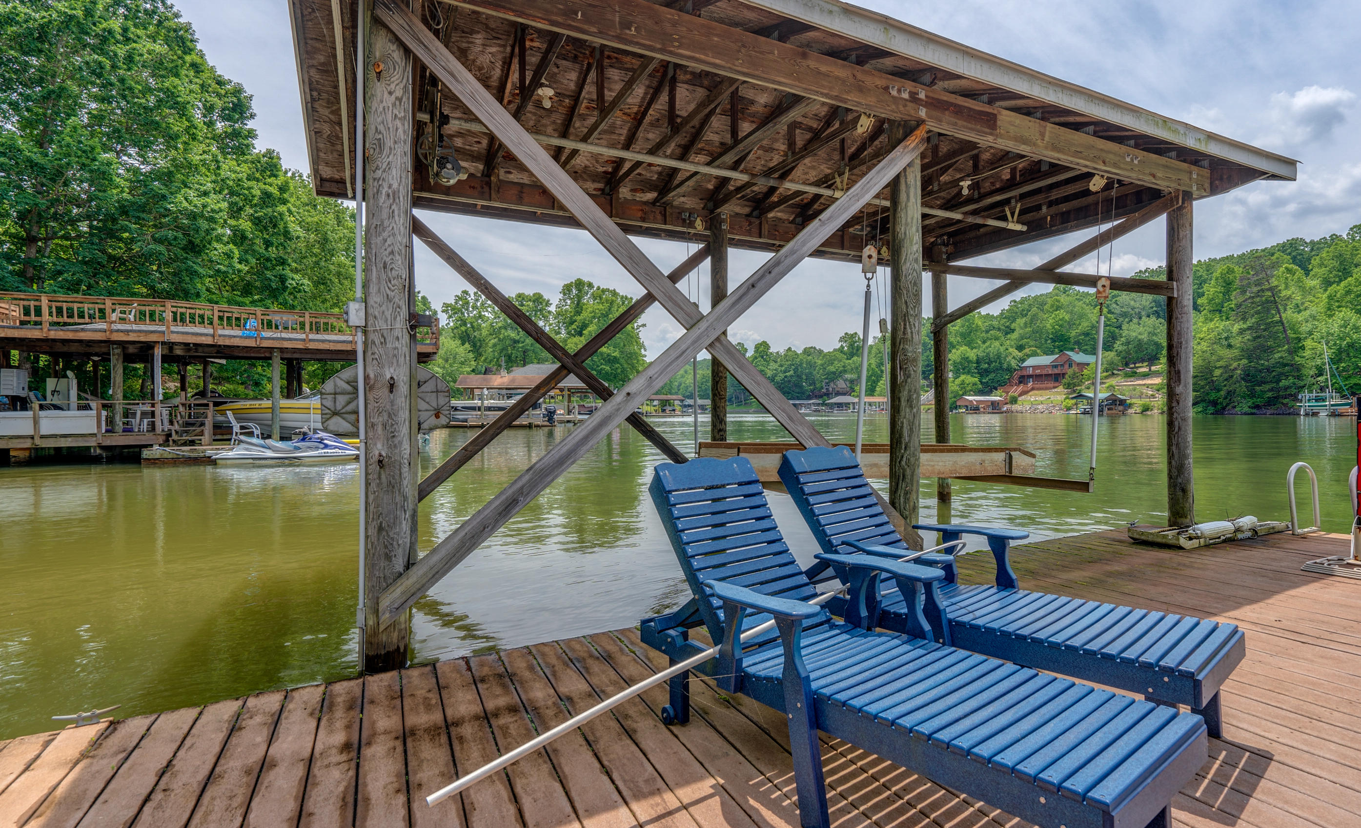 161 Highland Lake Road Union Hall, VA 24176 - Photo 39 of 45 a view of a patio with wooden floor chairs