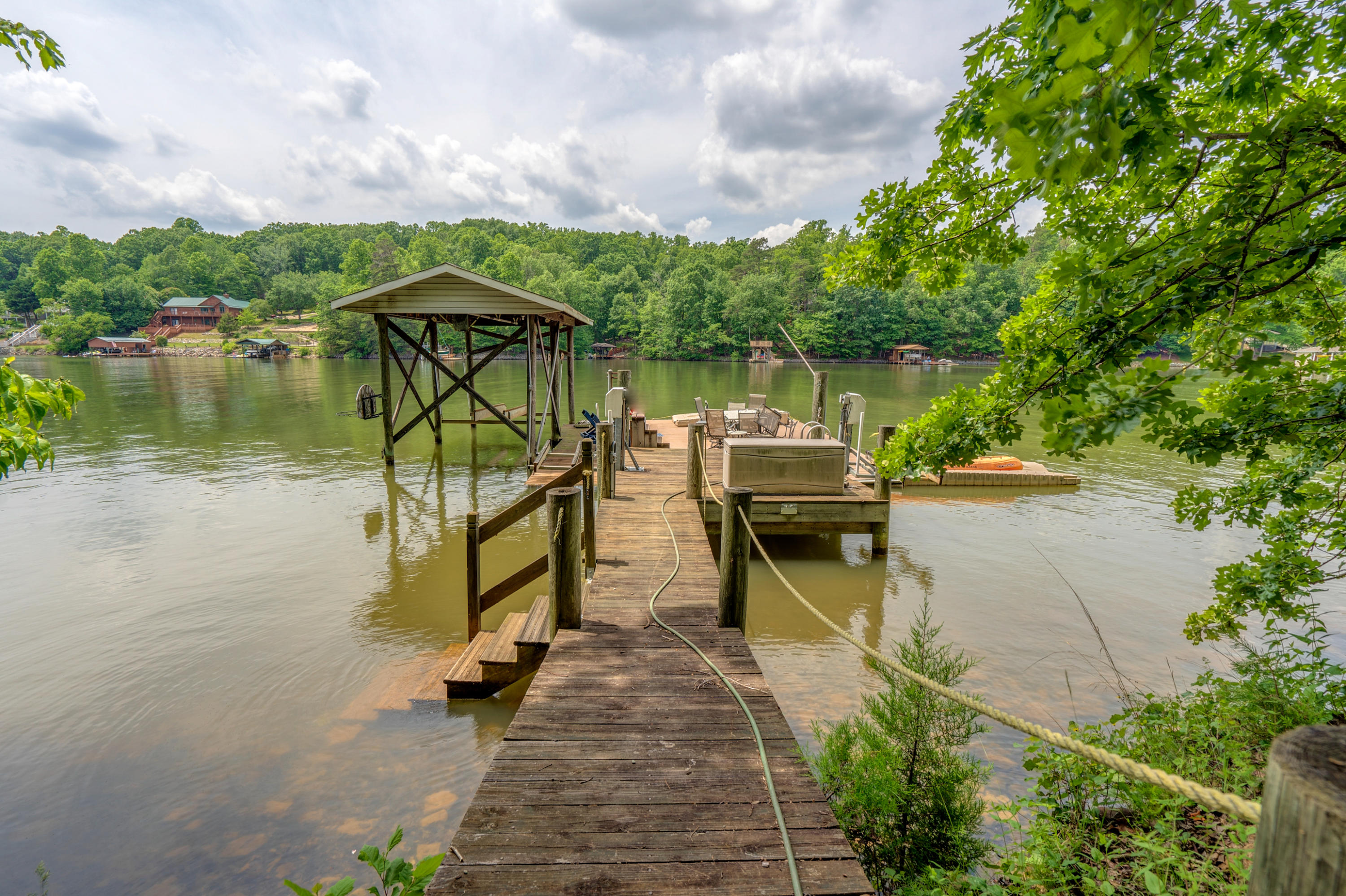 161 Highland Lake Road Union Hall, VA 24176 - Photo 40 of 45 a view of a lake with sitting area and lake view