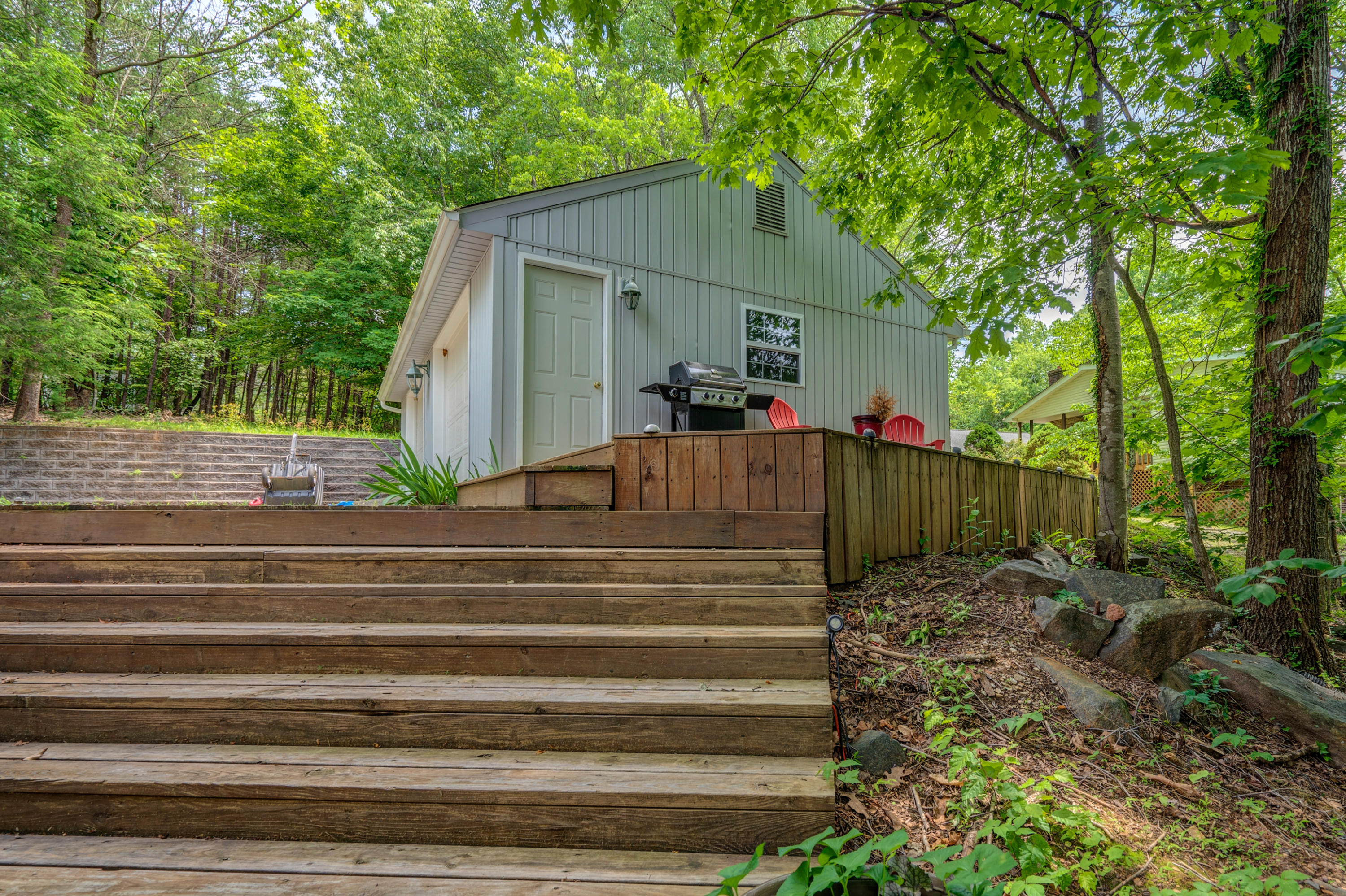 161 Highland Lake Road Union Hall, VA 24176 - Photo 44 of 45 a view of a house with a yard and large trees