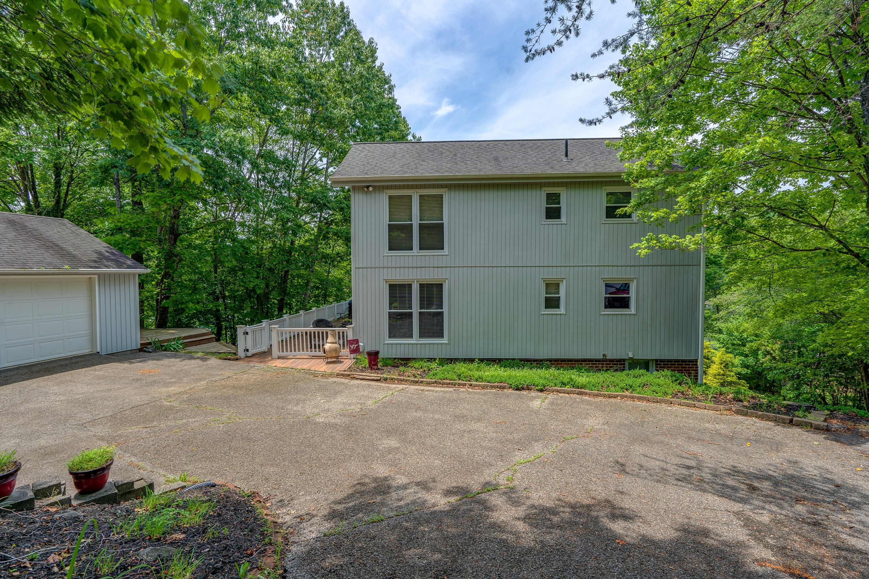 161 Highland Lake Road Union Hall, VA 24176 - Photo 45 of 45 a view of a house with a yard plants and large tree
