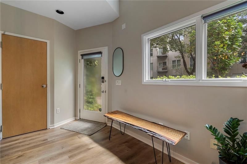 2188 Millennium Way Brookhaven, GA 30319 - Photo 18 of 52 a bedroom with a bed and a potted plant
