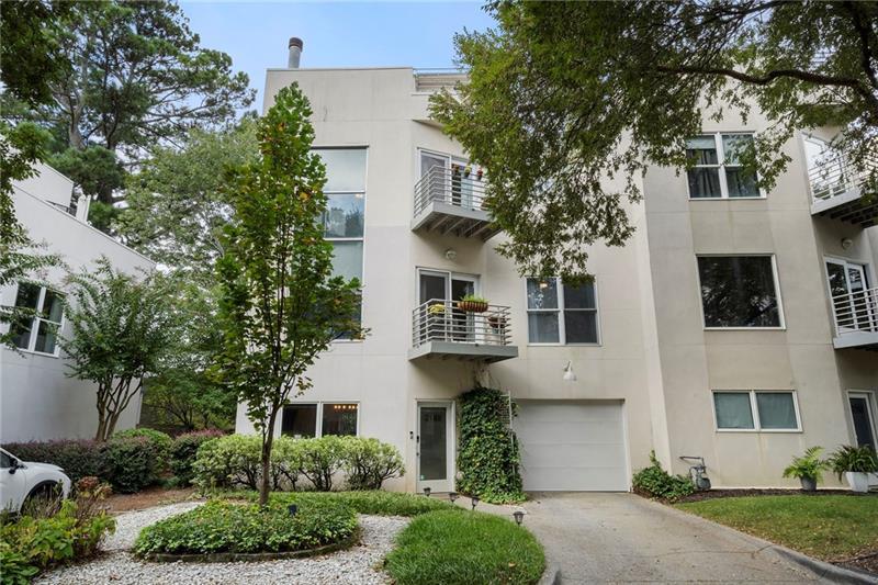 2188 Millennium Way Brookhaven, GA 30319 - Photo 2 of 52 a front view of a house with garden