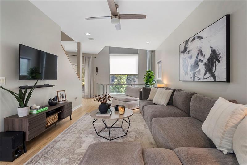2188 Millennium Way Brookhaven, GA 30319 - Photo 24 of 52 a living room with furniture and a flat screen tv