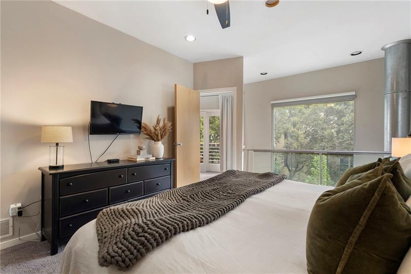 2188 Millennium Way Brookhaven, GA 30319 - Photo 41 of 52 a bedroom with a bed and a flat screen tv