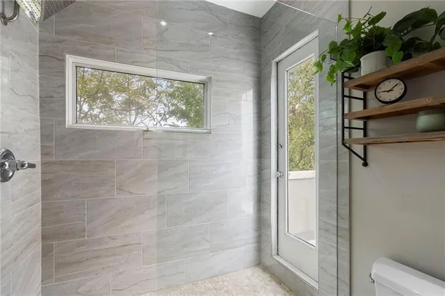 a view of roof deck with furniture