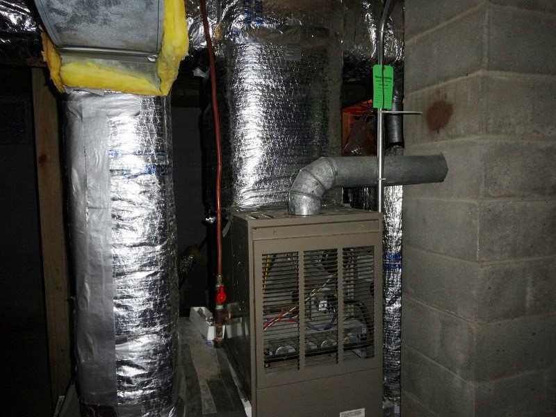 648 South Arm Road Andover, ME 04216 - Photo 17 of 26 Basement. Gas furnace and water heater