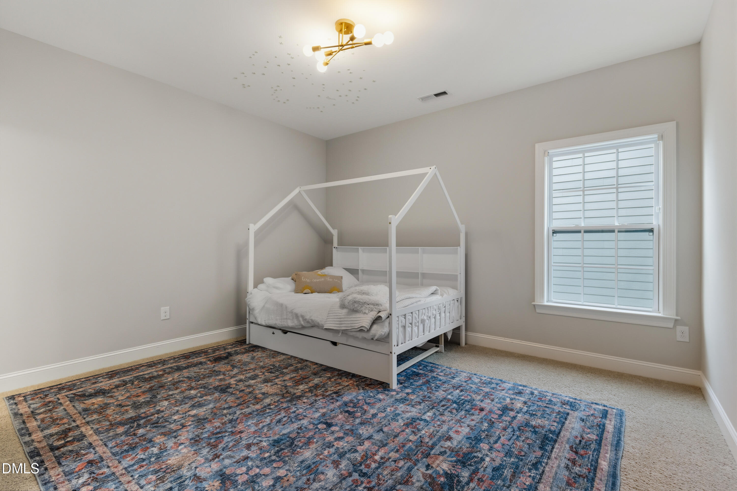 7421 Stonehenge Farm Lane Raleigh, NC 27613 - Photo 23 of 48 a living room with furniture and a rug