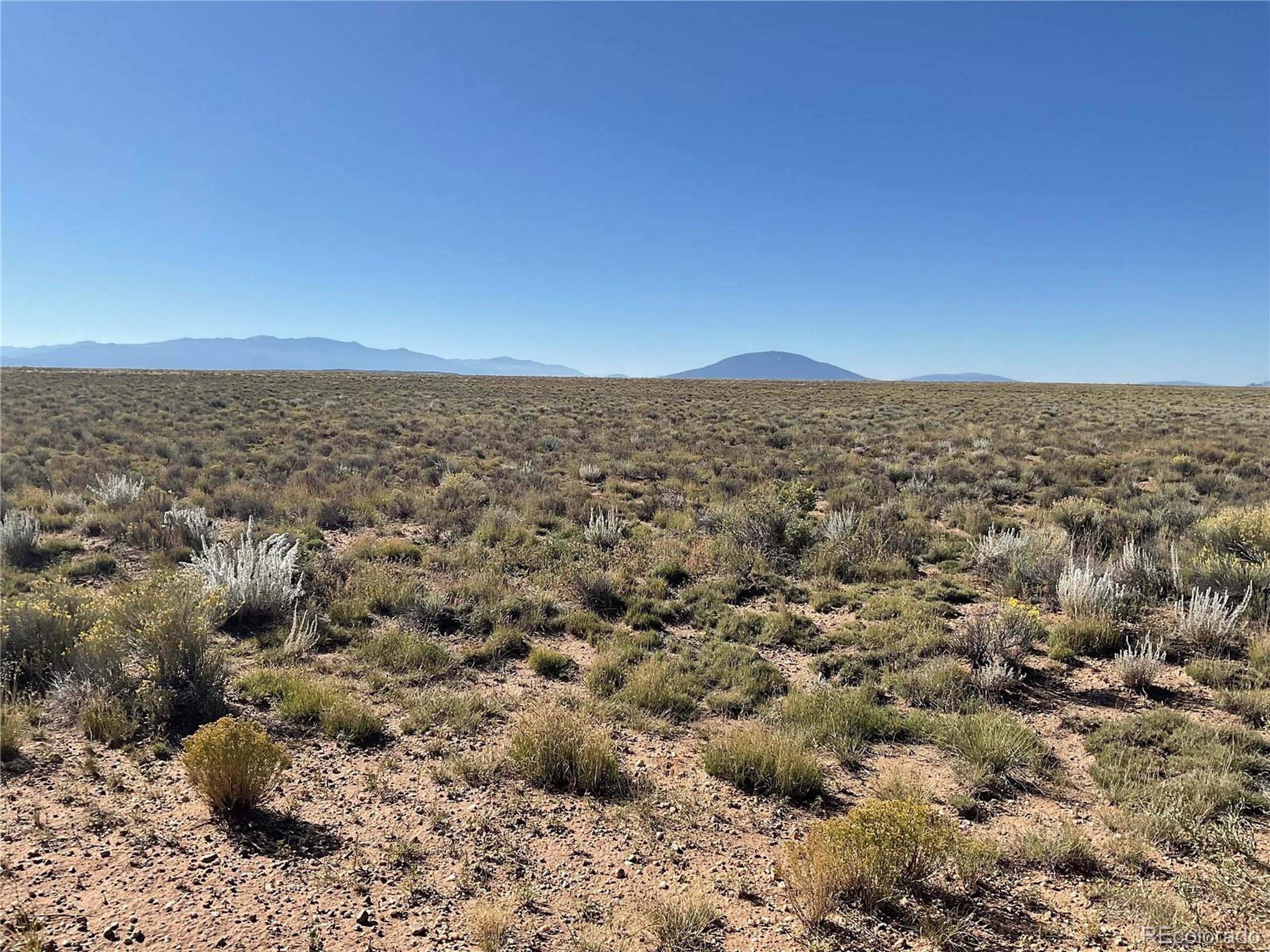2 Ben Road Sanford, CO 81151 - Photo 8 of 9 an aerial view of residential houses with outdoor space