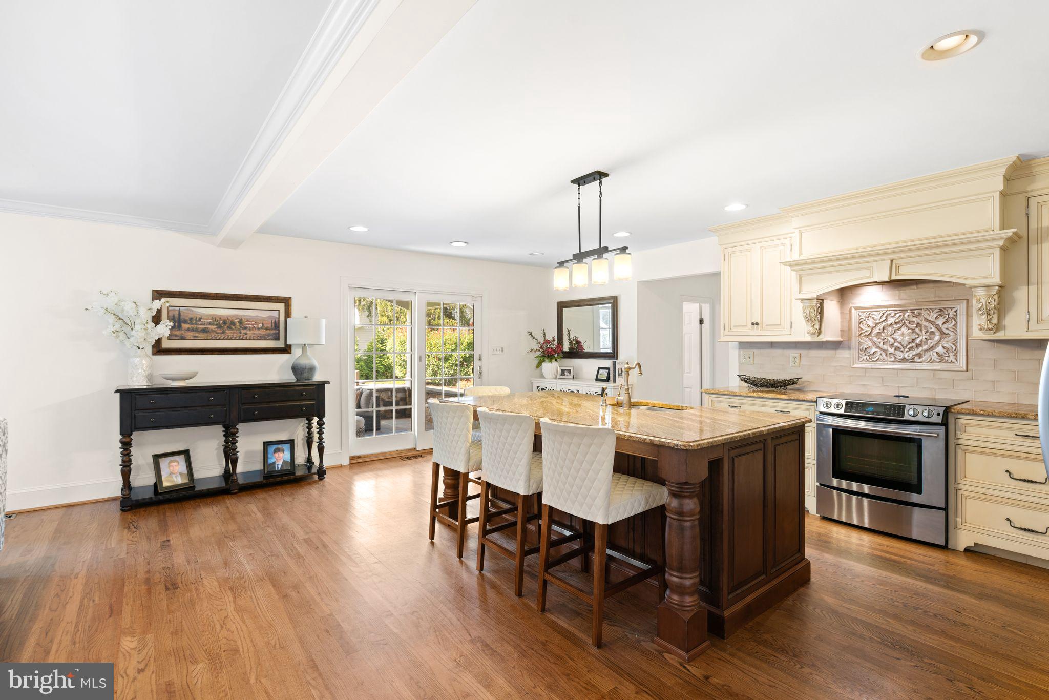 320 Warwick Road Haddonfield, NJ 08033 - Photo 11 of 41 a large kitchen with a table and chairs