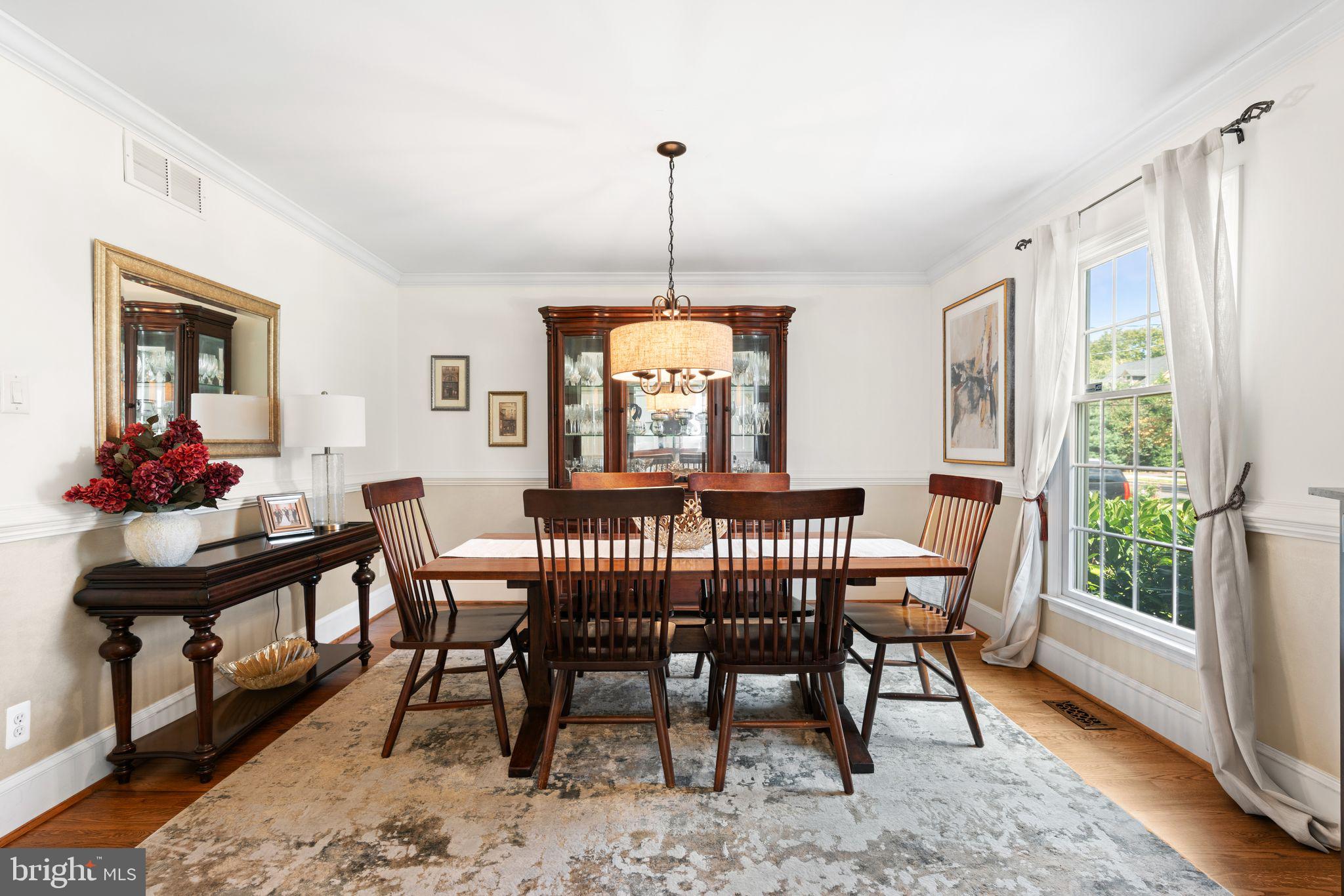 320 Warwick Road Haddonfield, NJ 08033 - Photo 13 of 41 a dining room with furniture window and wooden floor