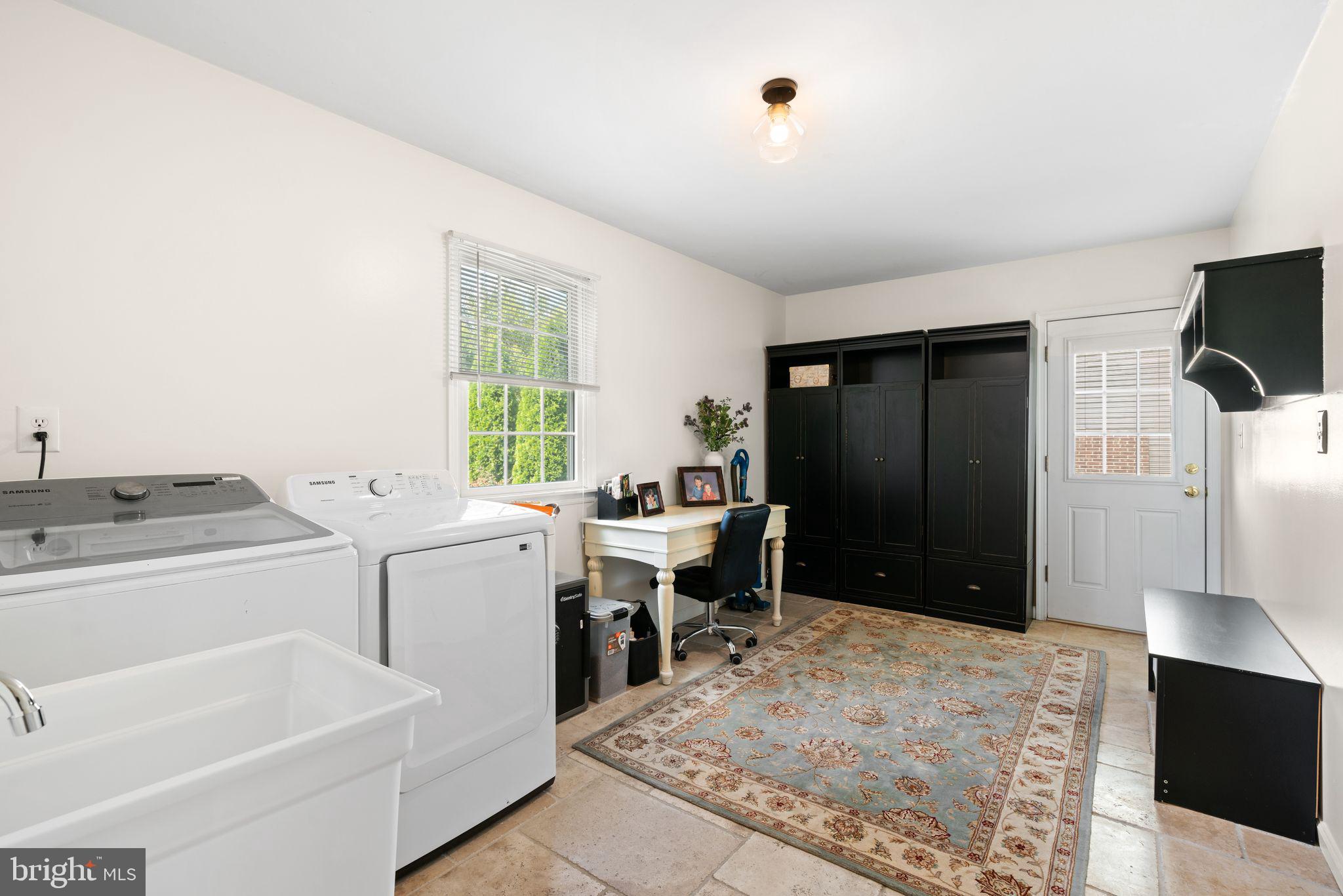 320 Warwick Road Haddonfield, NJ 08033 - Photo 17 of 41 a room with a sink and a refrigerator