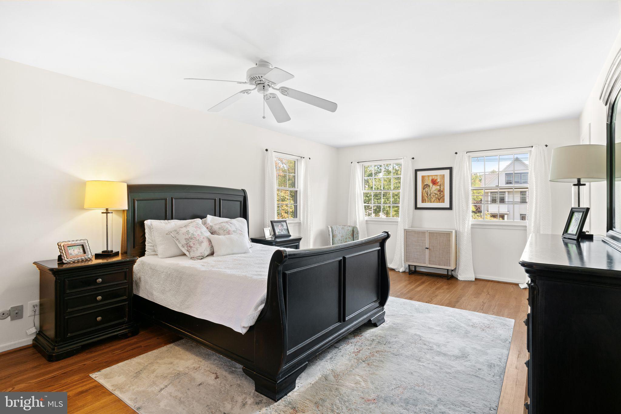 320 Warwick Road Haddonfield, NJ 08033 - Photo 19 of 41 a bedroom with a bed and wooden floor