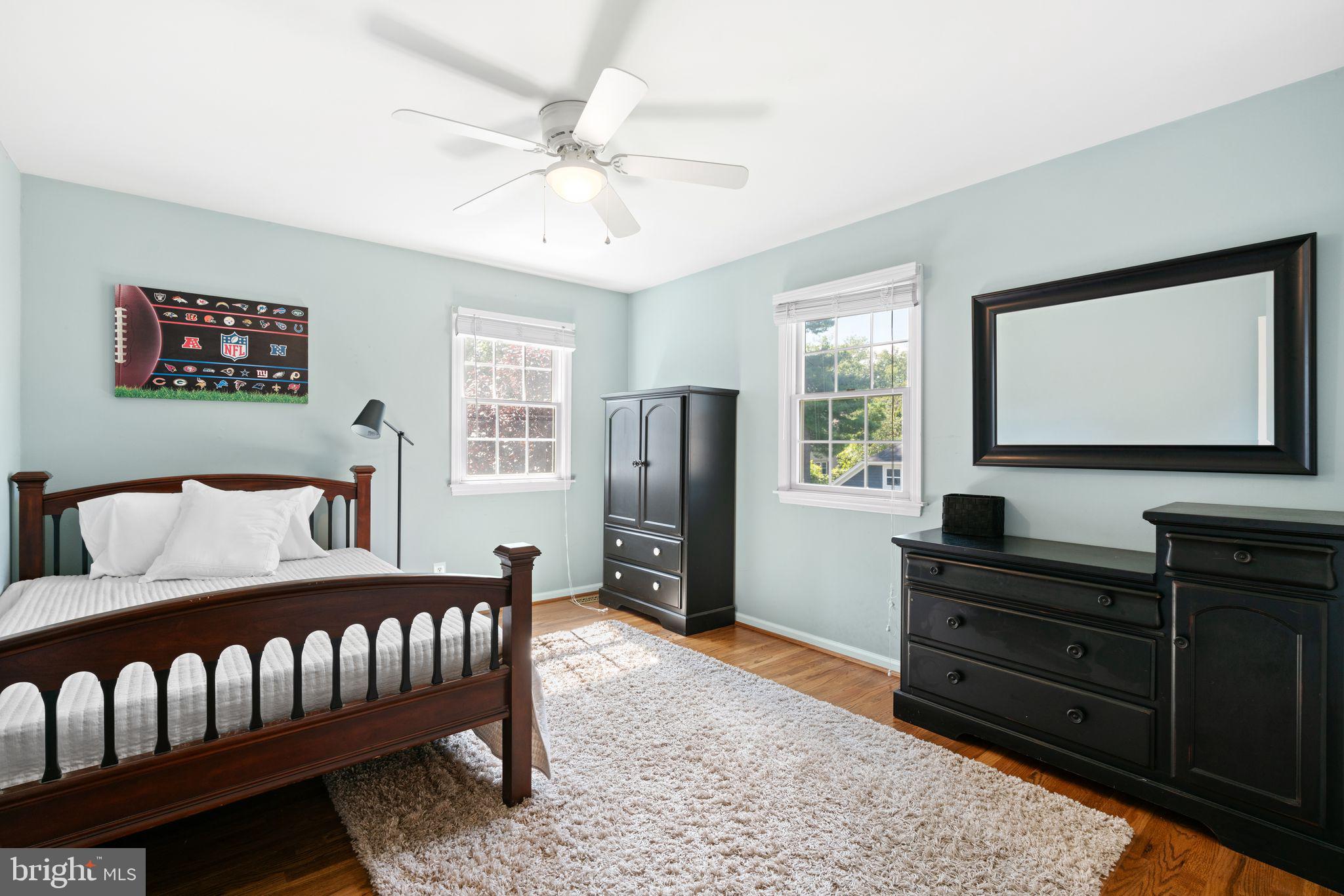 320 Warwick Road Haddonfield, NJ 08033 - Photo 26 of 41 a bedroom with a bed and a flat screen television
