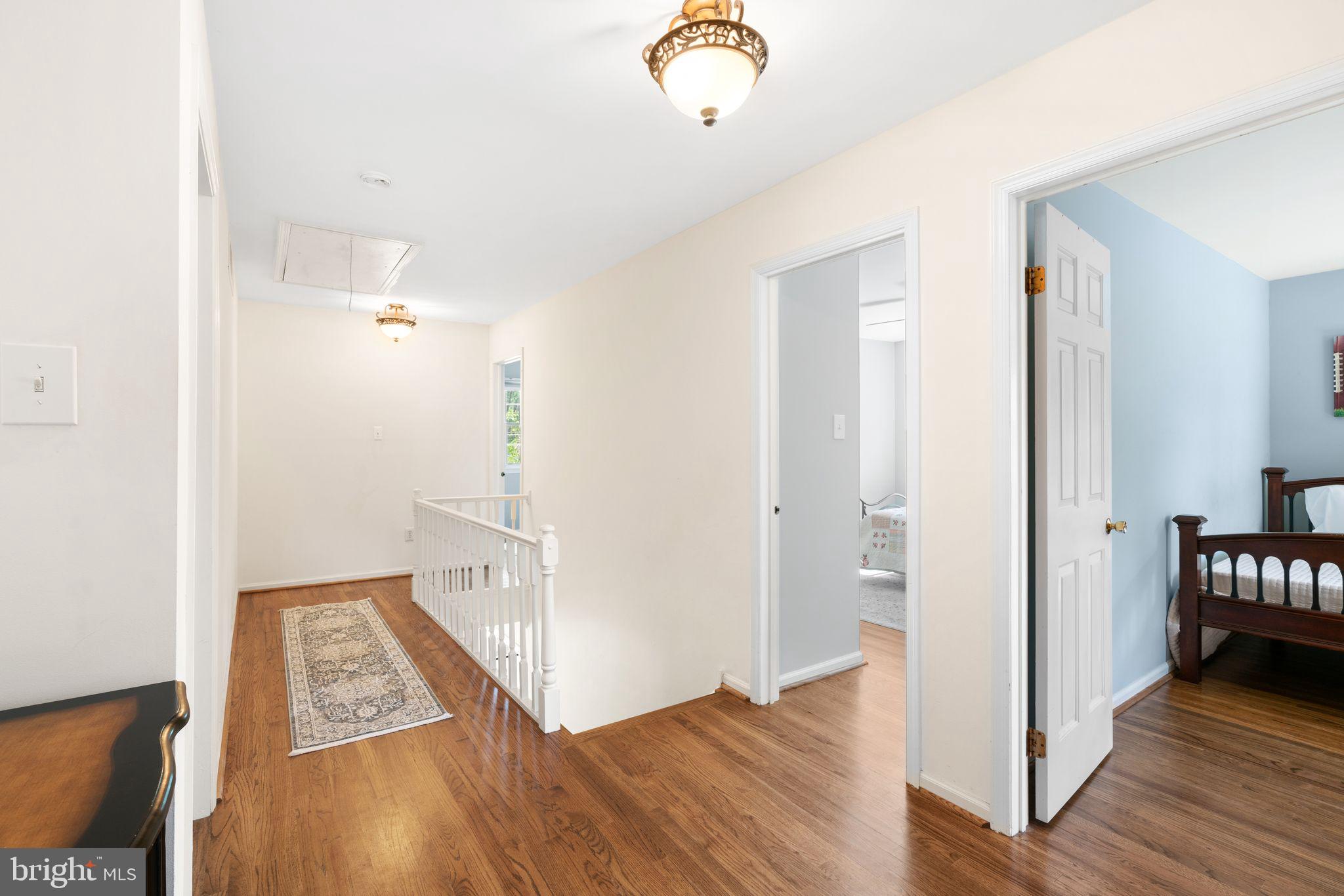 320 Warwick Road Haddonfield, NJ 08033 - Photo 30 of 41 a view of a hallway view with wooden floor and staircase