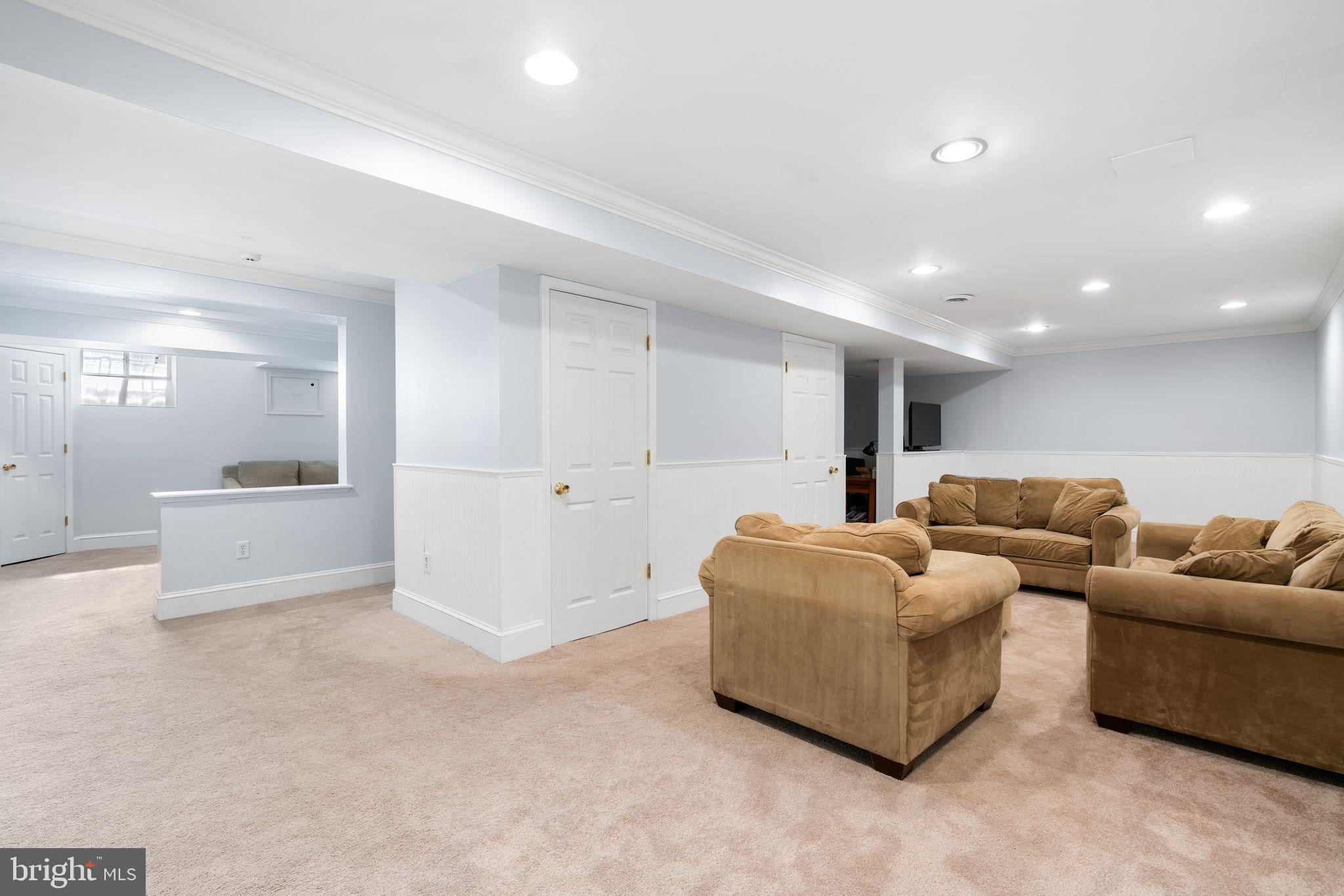 320 Warwick Road Haddonfield, NJ 08033 - Photo 33 of 41 a living room with furniture and a large window