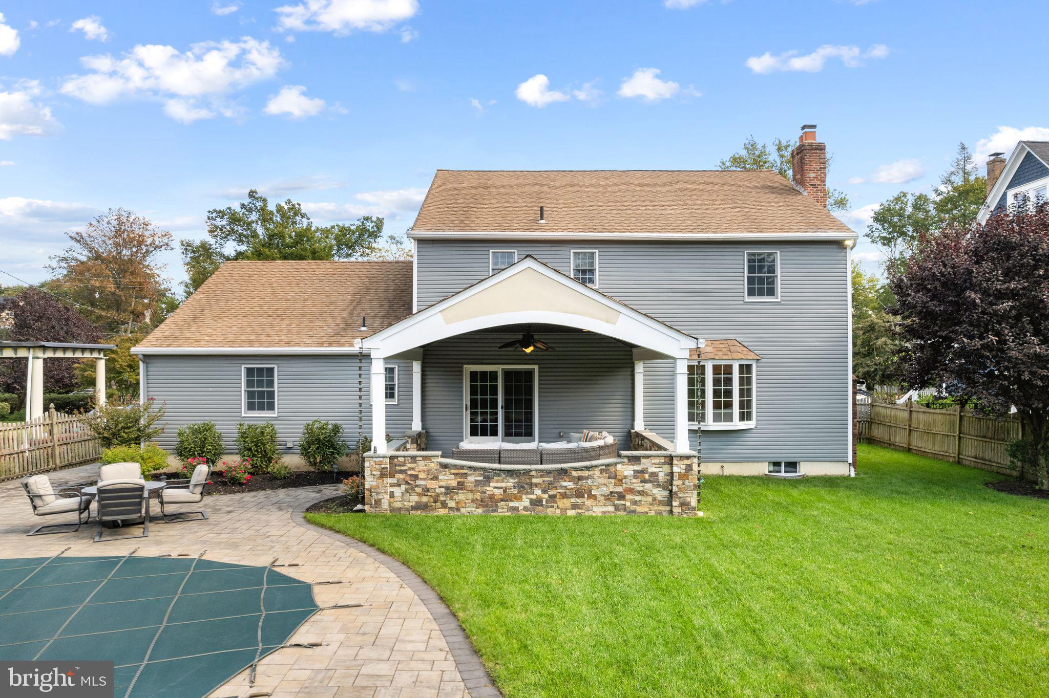 320 Warwick Road Haddonfield, NJ 08033 - Photo 37 of 41 a front view of house with yard and outdoor seating