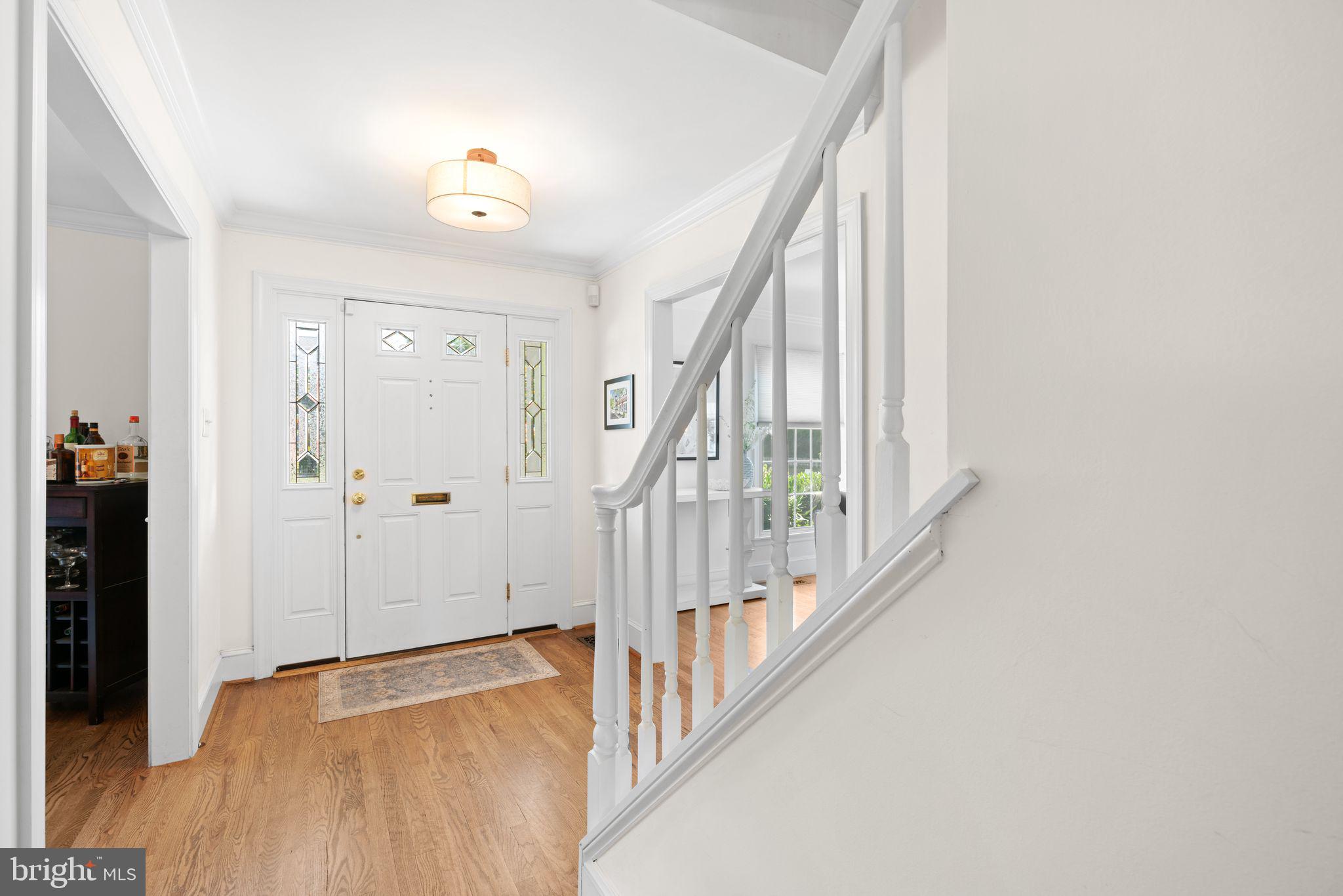 320 Warwick Road Haddonfield, NJ 08033 - Photo 5 of 41 a view of an entryway with wooden floor