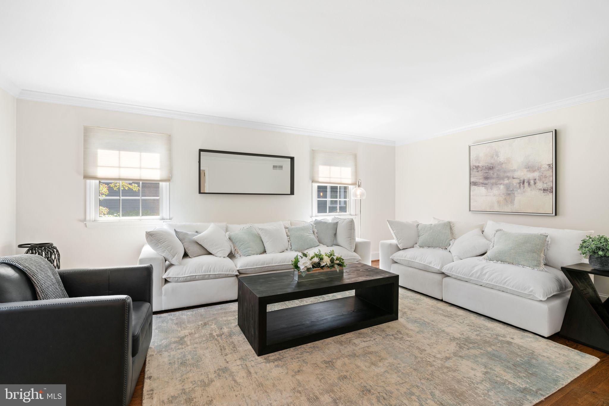 320 Warwick Road Haddonfield, NJ 08033 - Photo 7 of 41 a living room with furniture and a large window