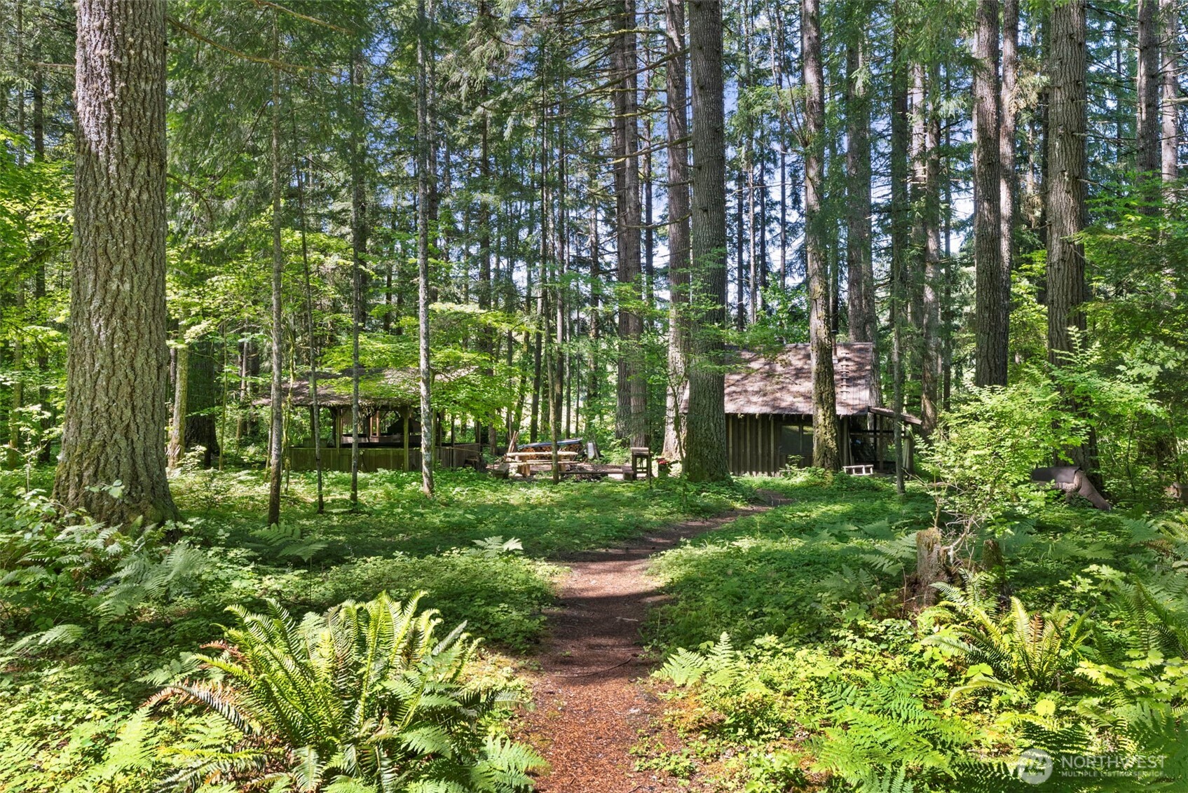 155 Bonell Road Randle, WA 98377 - Photo 33 of 38 a garden view with a fountain
