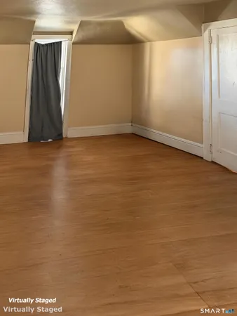 a view of small space with wooden floor