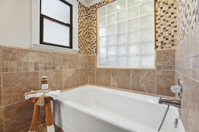 a bathroom with a bathtub