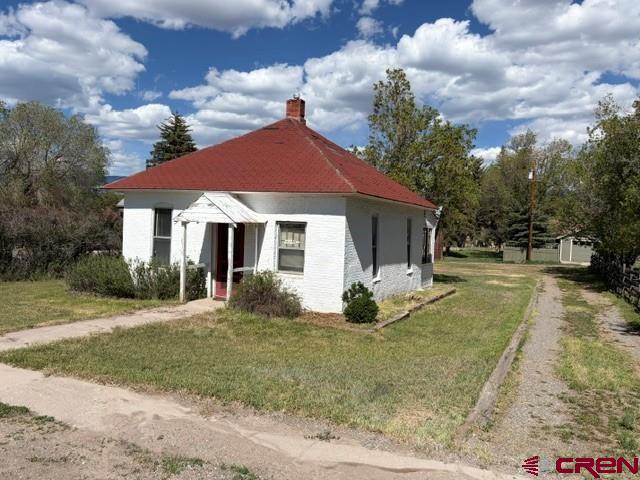 116 South Mary Street Ridgway, CO 81432 - Photo 21 of 23 a view of a house with a yard