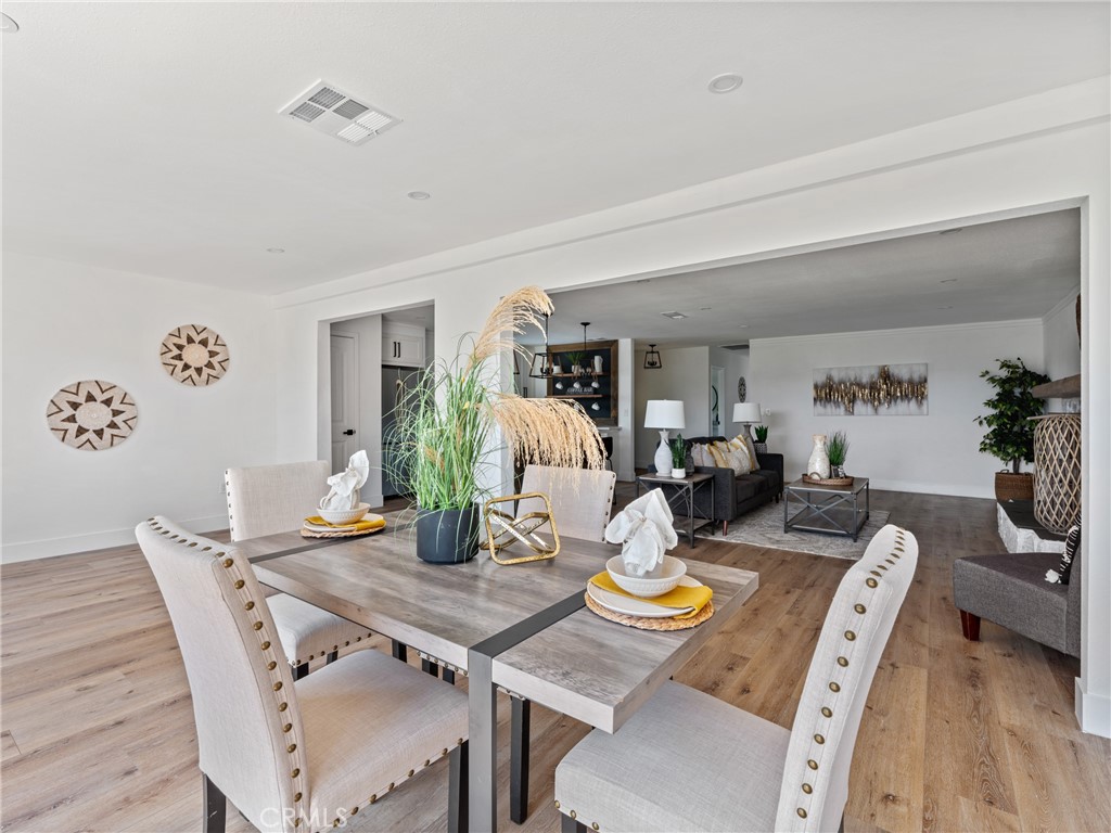 8419 18th Street Rancho Cucamonga, CA 91701 - Photo 11 of 28 a view of a dining room with furniture