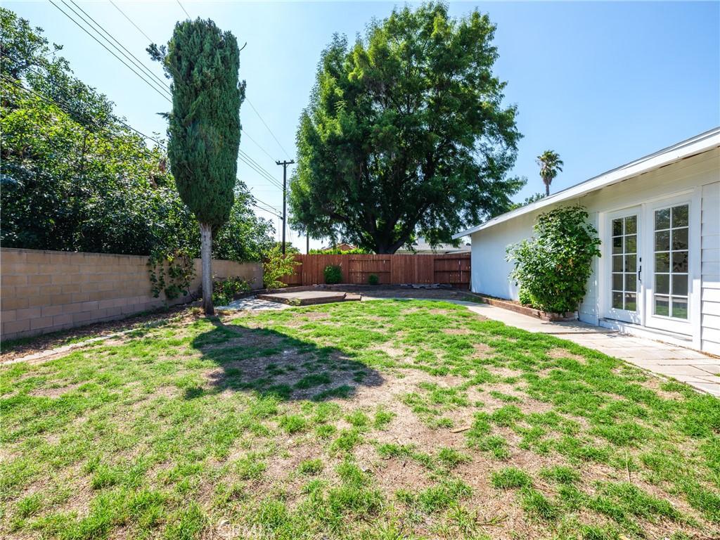 8419 18th Street Rancho Cucamonga, CA 91701 - Photo 26 of 28 a view of a backyard with a garden