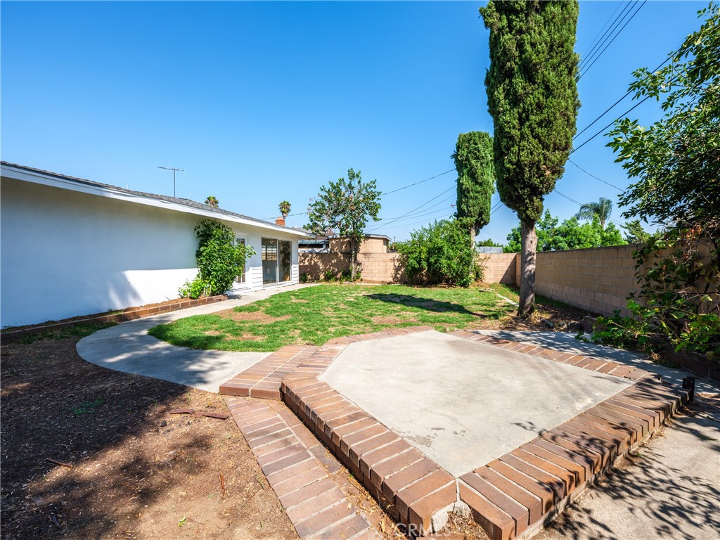 8419 18th Street Rancho Cucamonga, CA 91701 - Photo 28 of 28 a view of a house with a yard