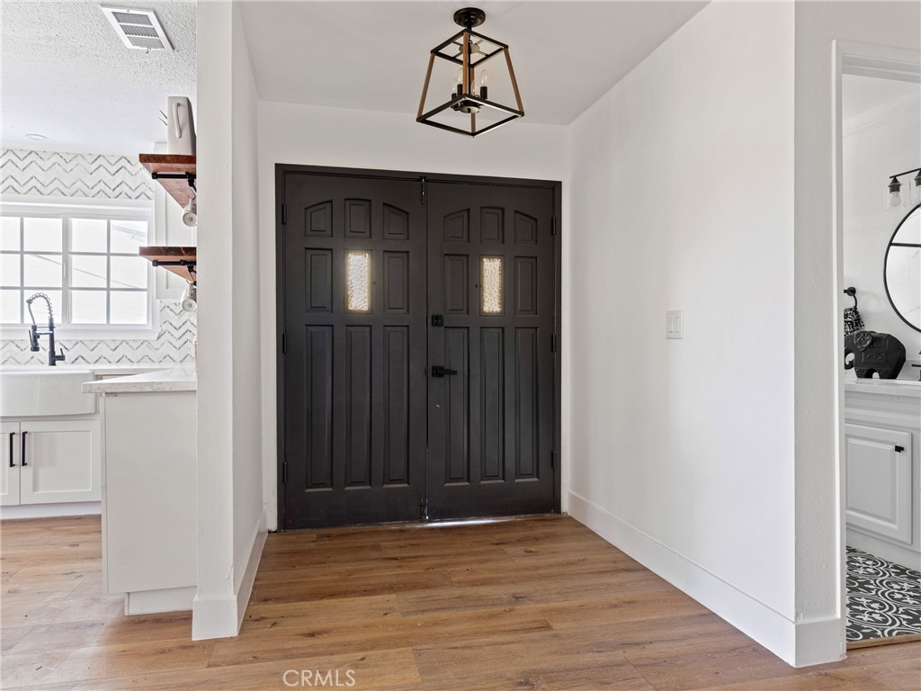 8419 18th Street Rancho Cucamonga, CA 91701 - Photo 3 of 28 a view of a entryway of the house