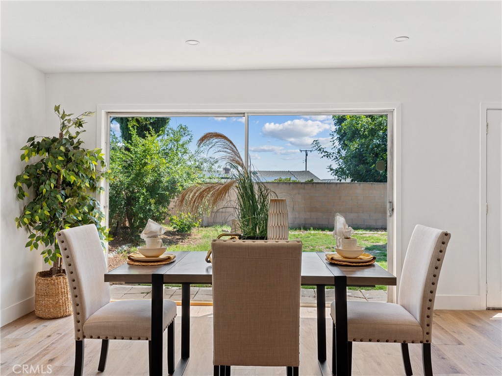 8419 18th Street Rancho Cucamonga, CA 91701 - Photo 10 of 28 a view of a dining room with furniture and window