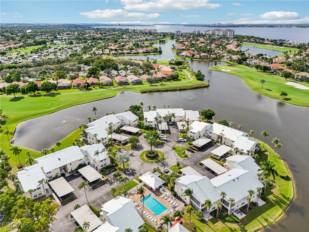 14983 Rivers Edge Court, Unit 230 Fort Myers, FL 33908 - Photo 35 of 47 an aerial view of a house with a swimming pool yard and outdoor seating