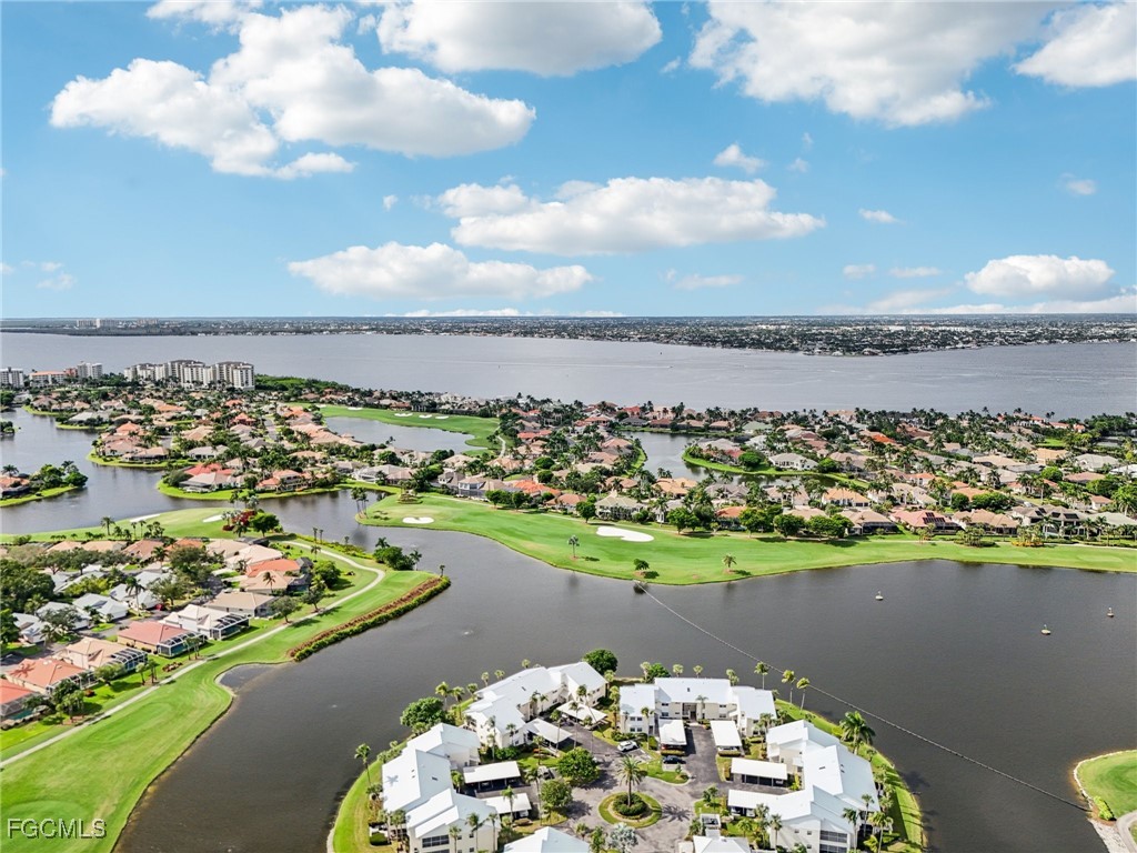 14983 Rivers Edge Court, Unit 230 Fort Myers, FL 33908 - Photo 36 of 47 a view of a lake with a city view