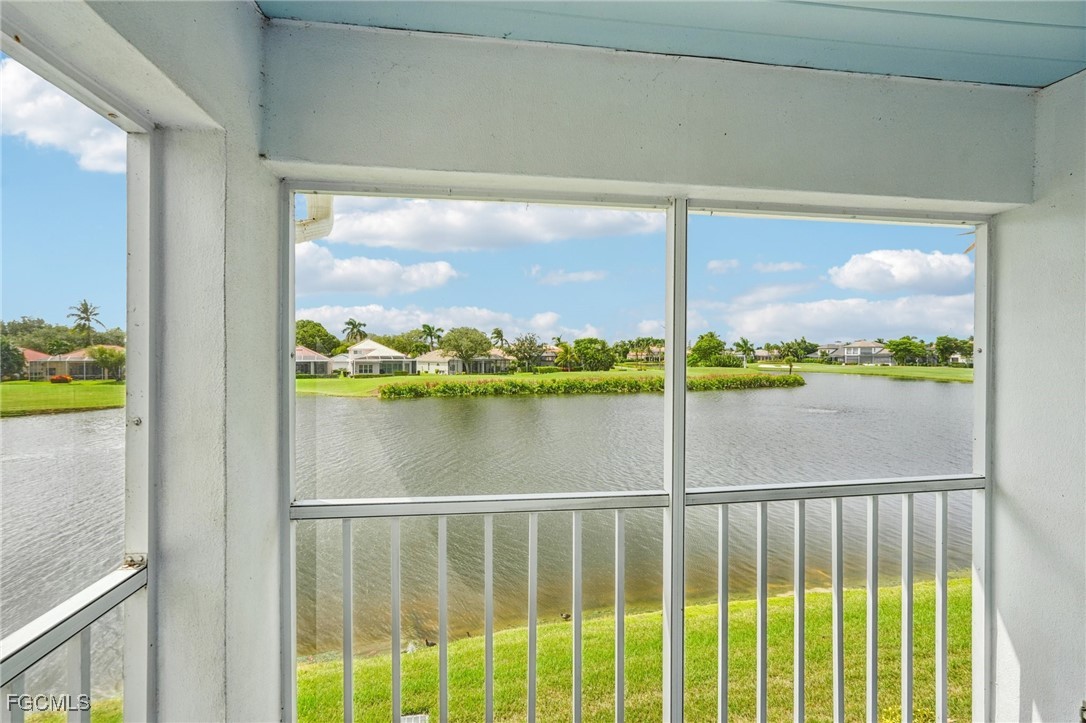 14983 Rivers Edge Court, Unit 230 Fort Myers, FL 33908 - Photo 6 of 47 a view of a balcony next to a yard