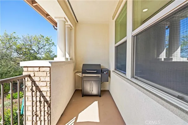 a view of a balcony with a sink