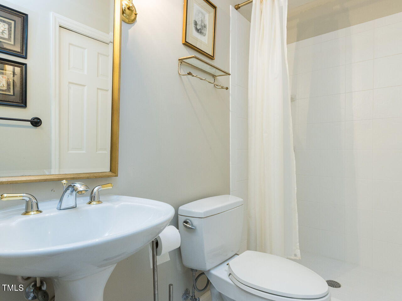 608 Ortega Road Raleigh, NC 27609 - Photo 14 of 34 Full bath on main floor.
