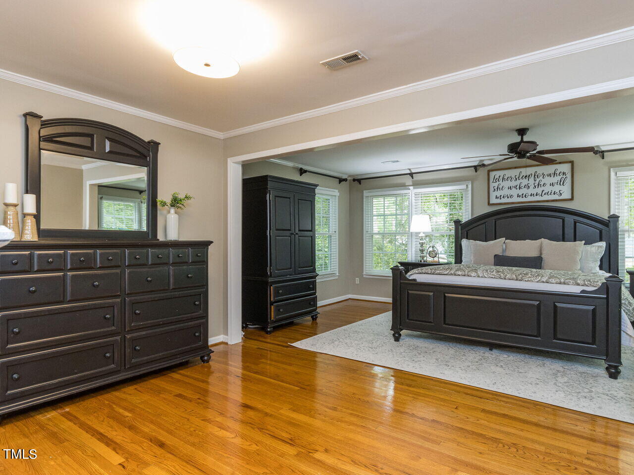 608 Ortega Road Raleigh, NC 27609 - Photo 18 of 34 Lovely hardwoods in primary bedroom!