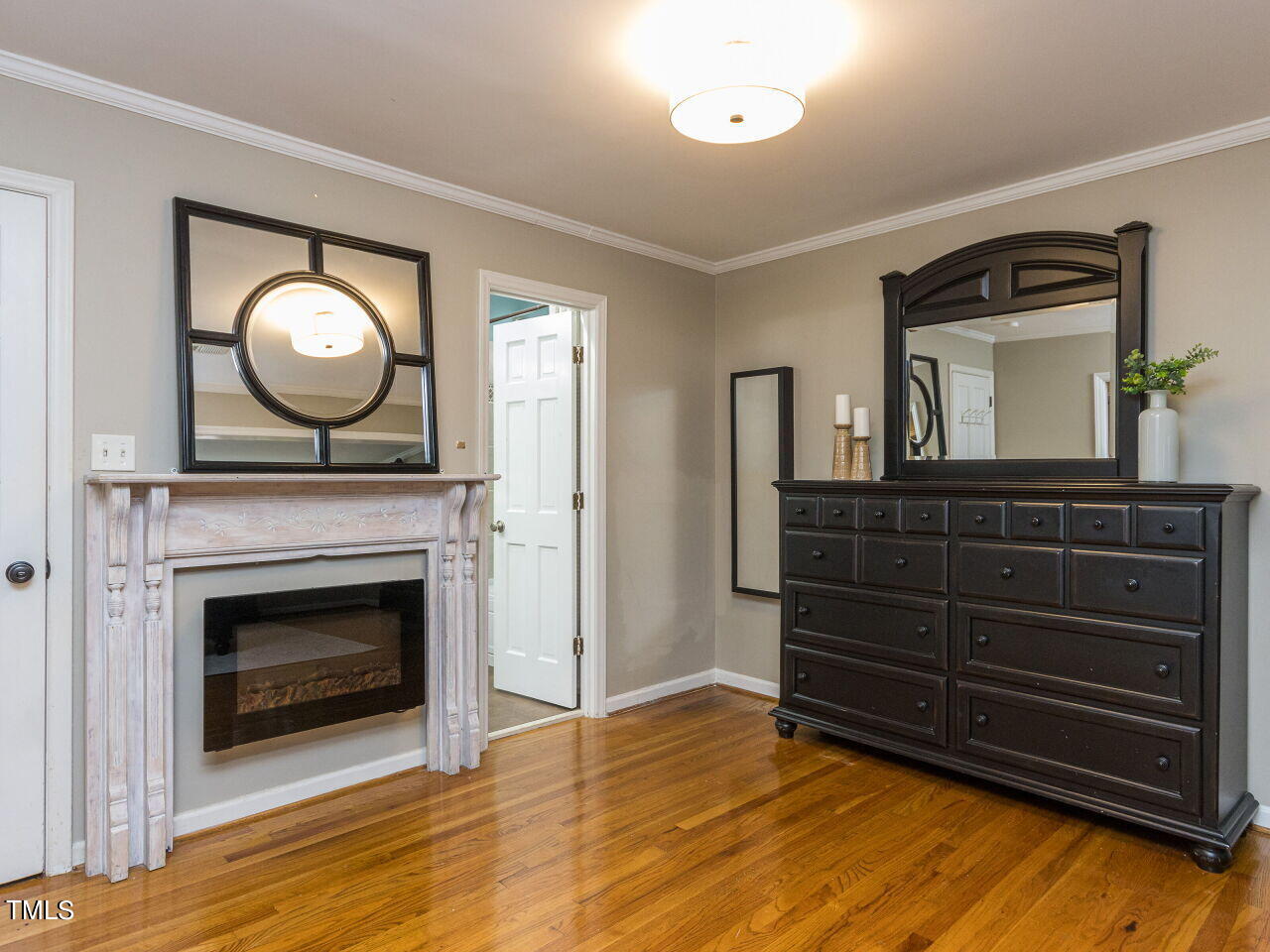 608 Ortega Road Raleigh, NC 27609 - Photo 19 of 34 Enjoy the electric fireplace!
