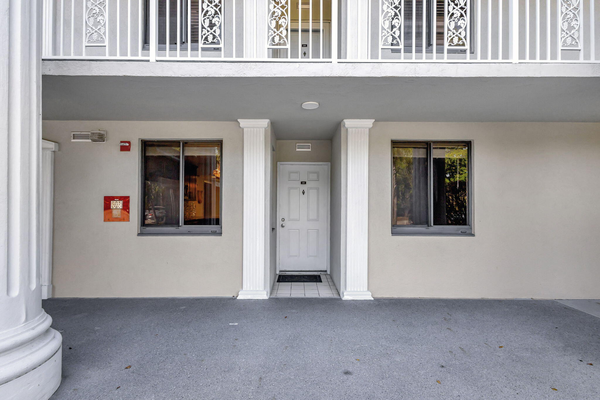 2741 Village Boulevard, Unit 104 West Palm Beach, FL 33409 - Photo 33 of 37 a view of an entrance of house