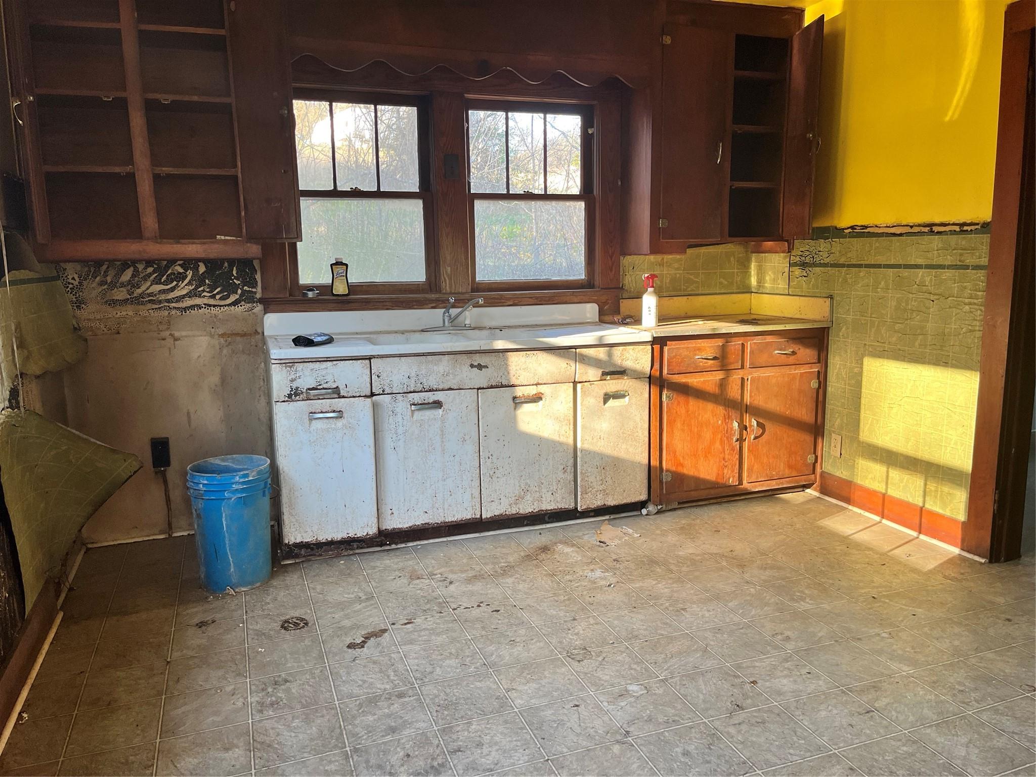 172 Rice Cove Road Canton, NC 28716 - Photo 13 of 36 a view of a kitchen with granite countertop cabinets and a sink