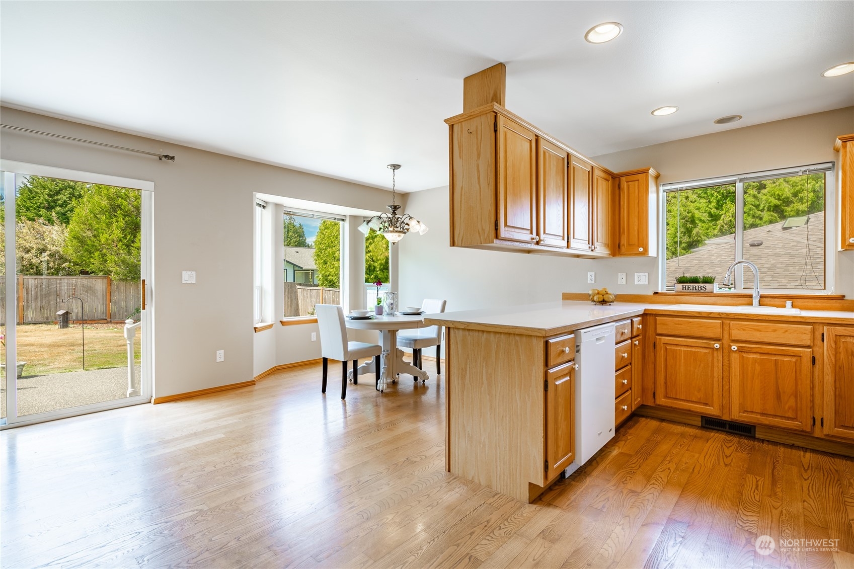 8087 Kispiox Road Blaine, WA 98230 - Photo 11 of 37 a kitchen with sink and cabinets